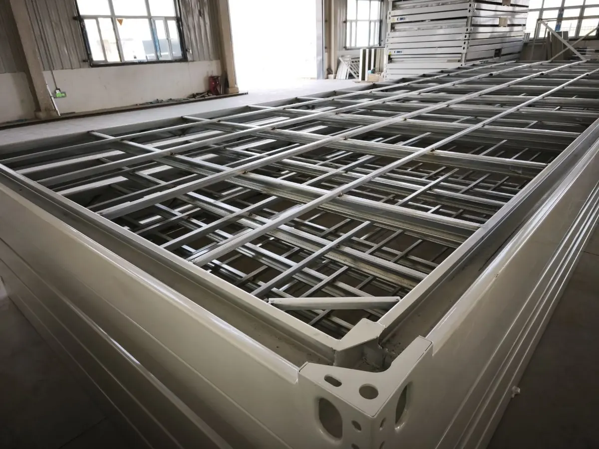 Floor frame with galvanized profile battens